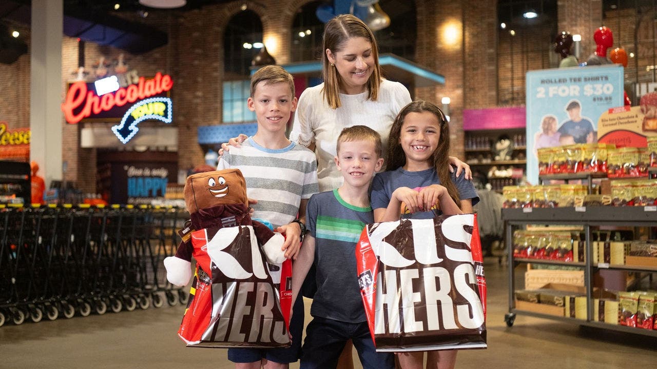 Family with shopping bags