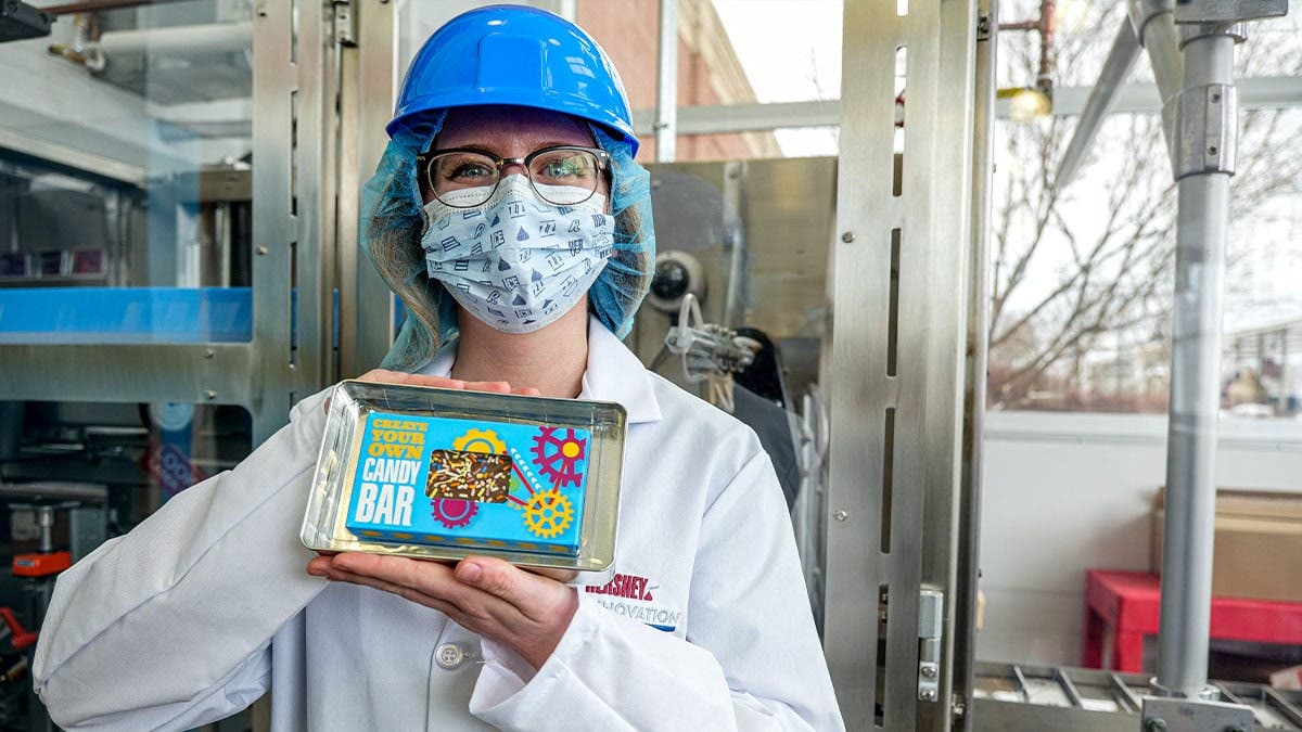 Person holding tray at Chocolate World