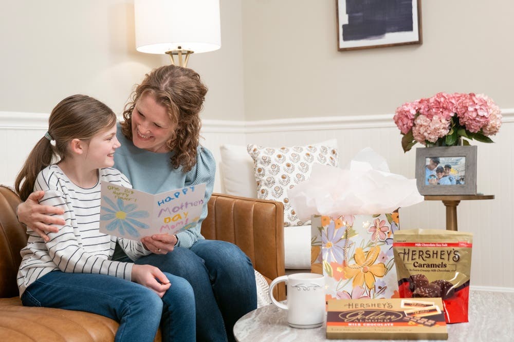 Mother and daughter enjoying candy