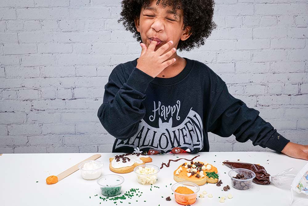 Girl decorating cookies