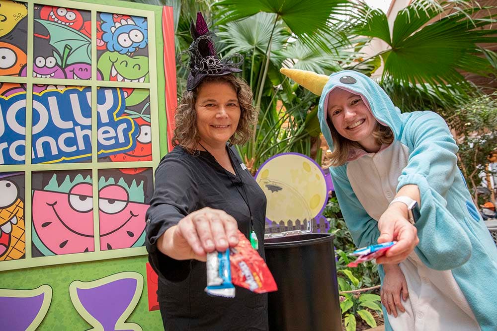 Women handing out candy