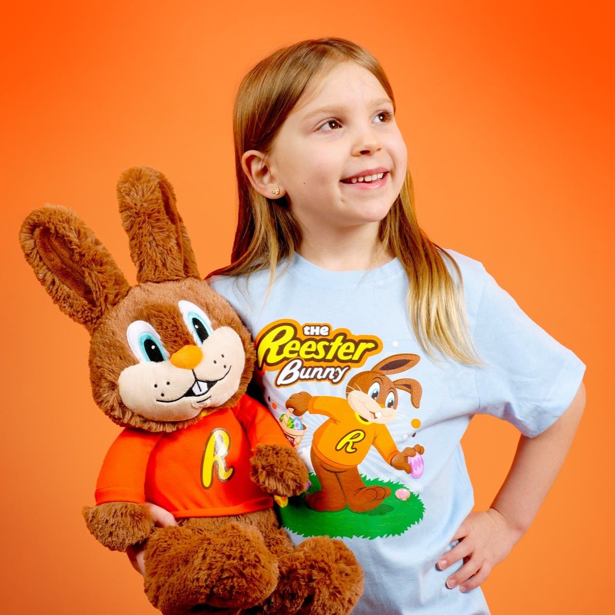 Girl holding REESTER BUNNY